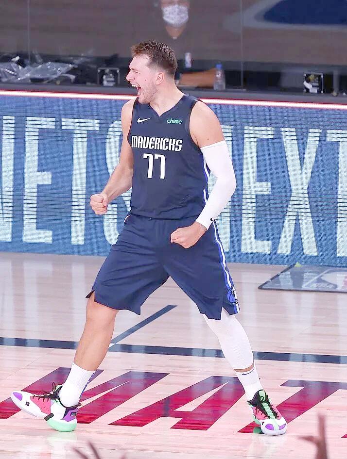 九游体育-东契奇在美国队比赛中战术调整,突破纪录引发热议!的简单介绍